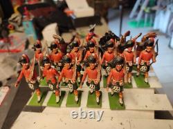 11 Scottish soldiers + one officer at the parade, British