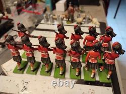 11 Scottish soldiers + one officer at the parade, British