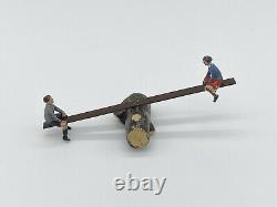 BRITAINS LEAD HOME FARM GARDEN SERIES BOY & GIRL ON SEESAW #618 1950s