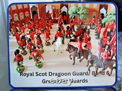 Britains/Grenadier guardsx50+4/ Royal Scots dragoon guards X 38+6 in unique tin